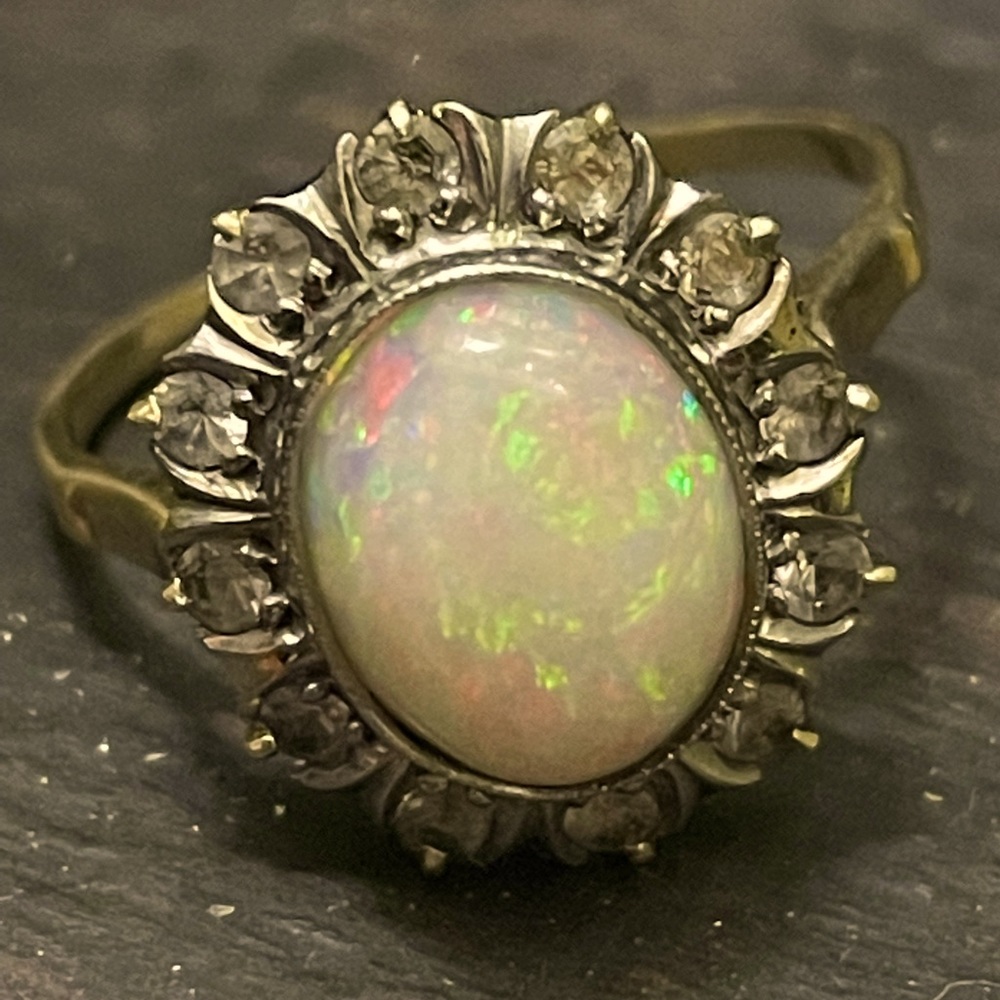 Antique Full Opal w/Starburst Diamond.Reasonable offers welcome 4 this rare find